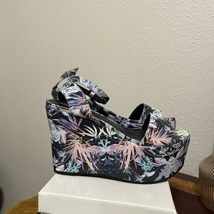 SCHUTZ platform wedges in purple and blue floral pattern.